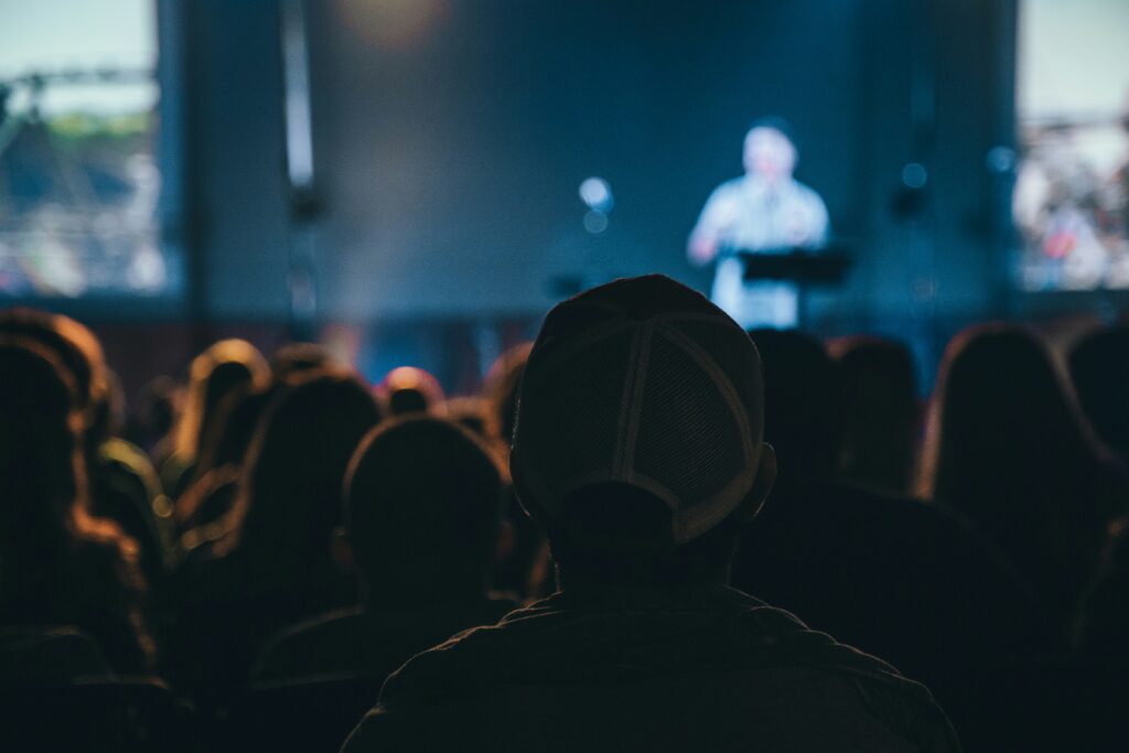 Audience listening to a speaker